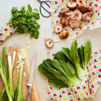 Beeswax Food Wraps (Tulip) keeping pak choi and mushrooms fresh