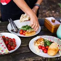 Beeswax Food Wraps (Tulip) covering plates of food