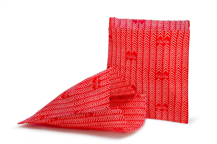 Reusable Beeswax Sandwich Bags made from beeswax wraps. Red Chevron pattern on a white background